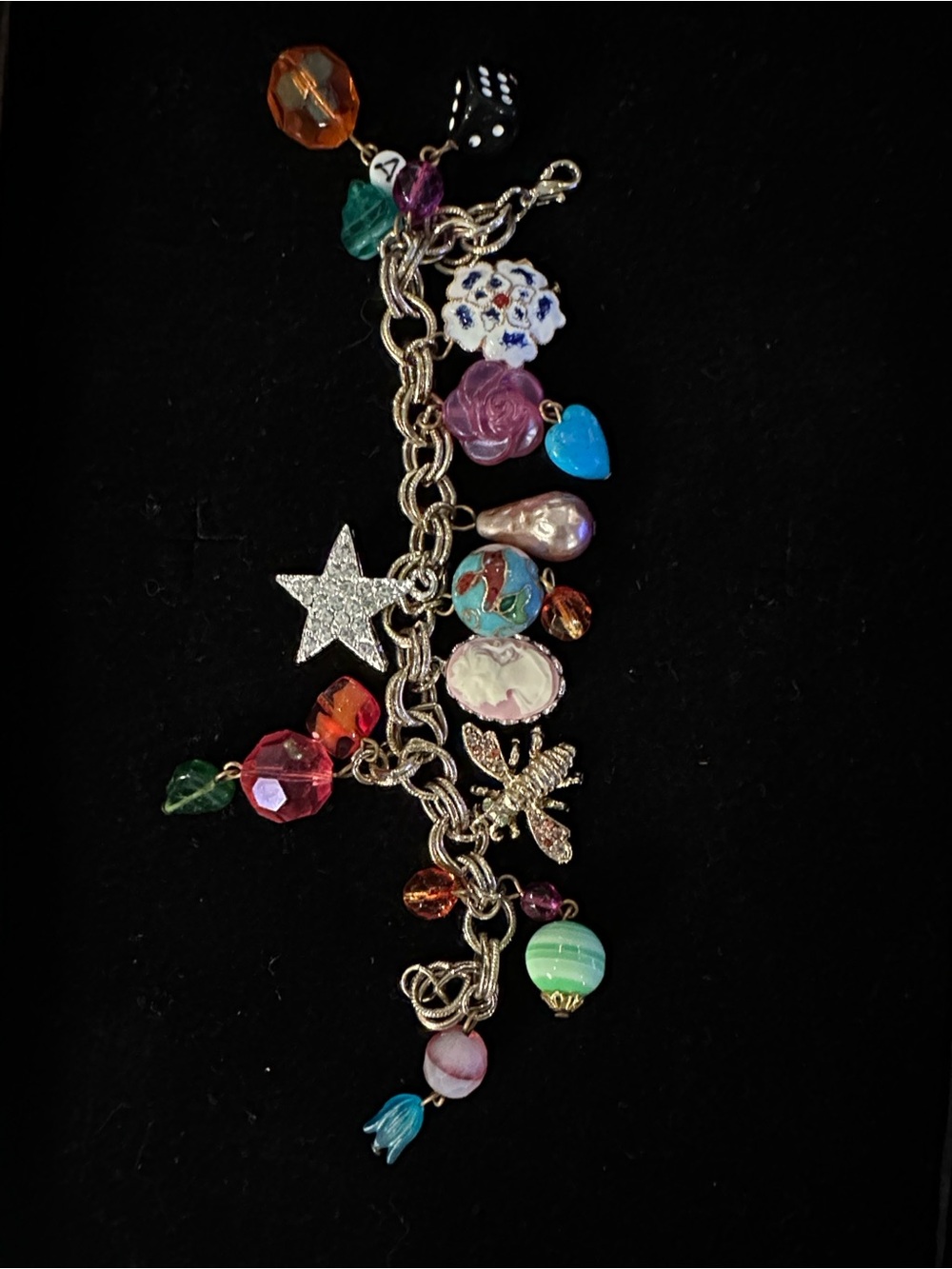 Gold-Tone Multicolor Charm Bracelet with Star and Floral Accents